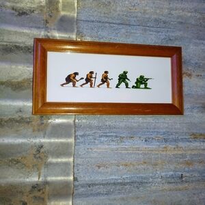 Evolution Plastic Army Men Framed Art Print By Neon Nicho